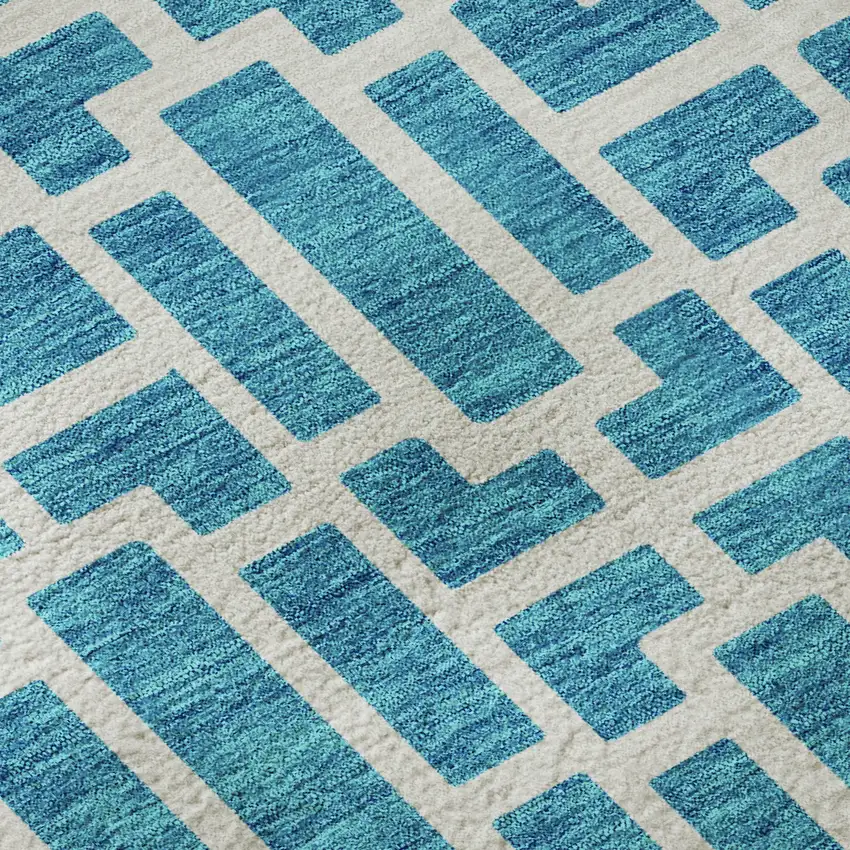 8' Turquoise And Ivory Geometric Washable Round Rug With UV Protection Photo 9