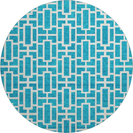 8' Turquoise And Ivory Geometric Washable Round Rug With UV Protection Photo 1