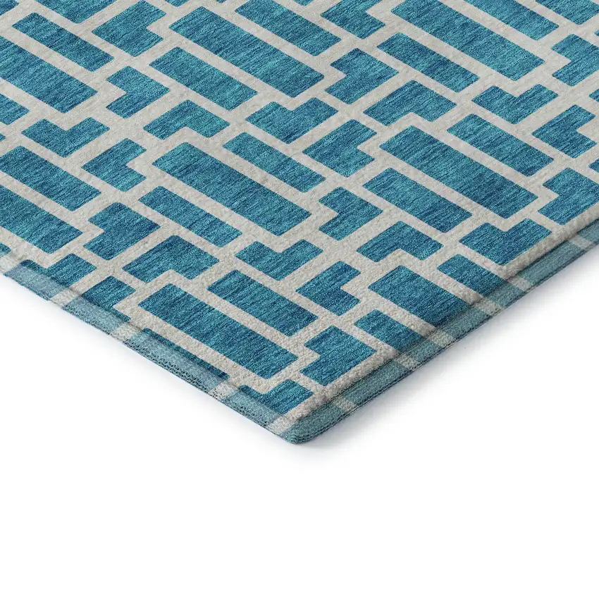 8' Turquoise And Ivory Geometric Washable Round Rug With UV Protection Photo 7