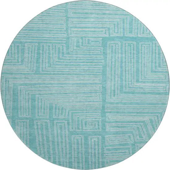 8' Turquoise And Ivory Geometric Washable Round Rug With UV Protection Photo 1
