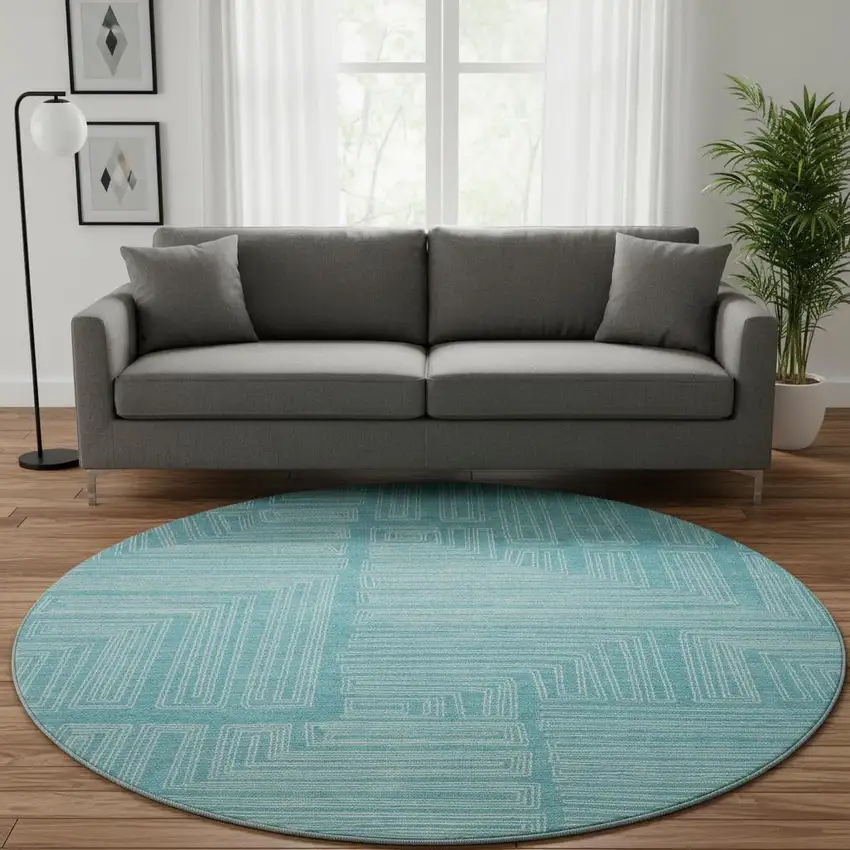 8' Turquoise And Ivory Geometric Washable Round Rug With UV Protection Photo 2