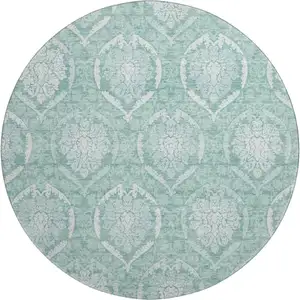 Photo of 8' Turquoise And Ivory Medallion Washable Round Rug With UV Protection