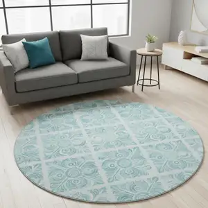 Photo of 8' Turquoise And Ivory Medallion Washable Round Rug With UV Protection