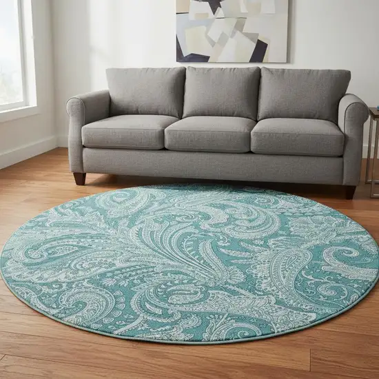 8' Turquoise And Ivory Paisley Washable Round Rug With UV Protection Photo 2