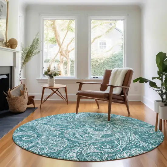 8' Turquoise And Ivory Paisley Washable Round Rug With UV Protection Photo 5