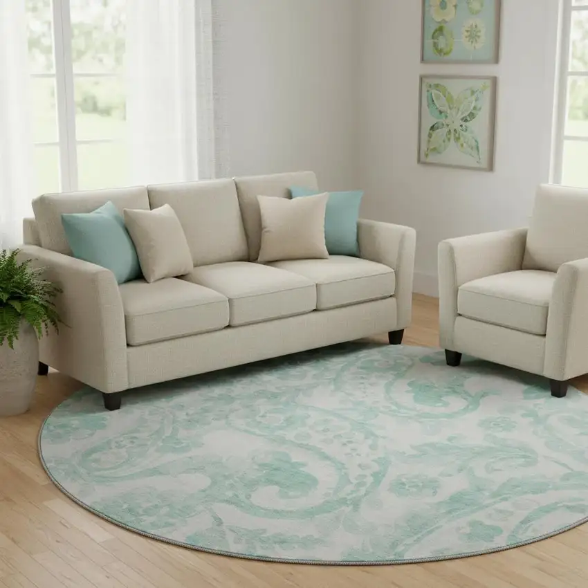 8' Turquoise And Ivory Paisley Washable Round Rug With UV Protection Photo 1