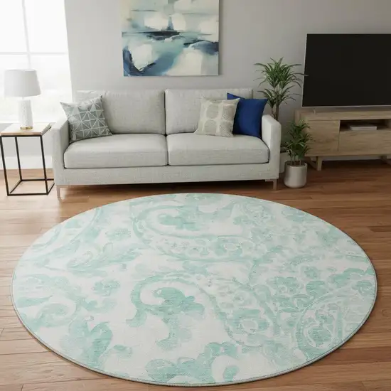8' Turquoise And Ivory Paisley Washable Round Rug With UV Protection Photo 2