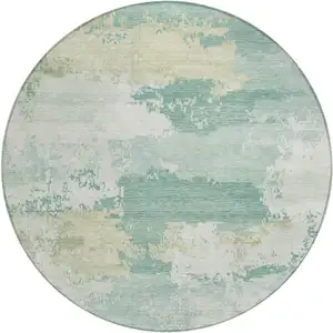 Photo of 8' Turquoise And Ivory Round Abstract Washable Indoor Outdoor Area Rug