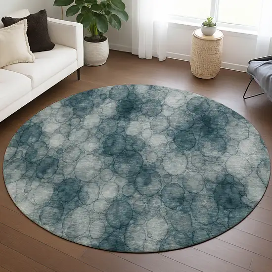 8' Turquoise And Ivory Round Abstract Washable Indoor Outdoor Area Rug Photo 5
