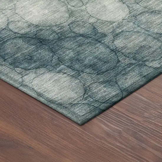 8' Turquoise And Ivory Round Abstract Washable Indoor Outdoor Area Rug Photo 8