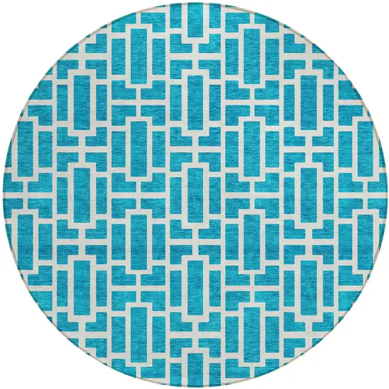 8' Turquoise And Ivory Round Geometric Washable Indoor Outdoor Area Rug Photo 1