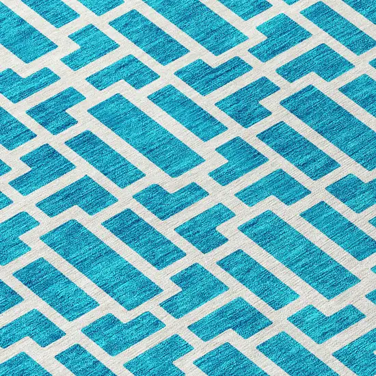8' Turquoise And Ivory Round Geometric Washable Indoor Outdoor Area Rug Photo 6