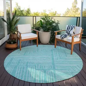 Photo of 8' Turquoise And Ivory Round Geometric Washable Indoor Outdoor Area Rug