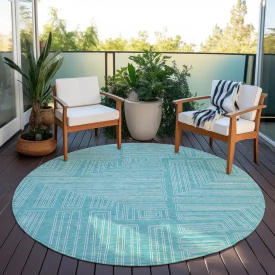 8' Turquoise And Ivory Round Geometric Washable Indoor Outdoor Area Rug Photo 7