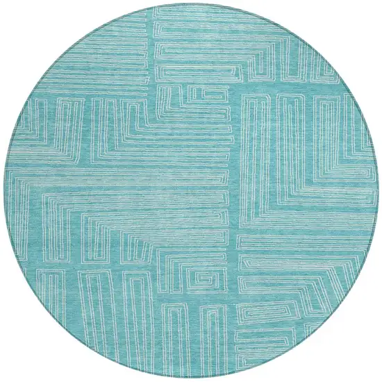 8' Turquoise And Ivory Round Geometric Washable Indoor Outdoor Area Rug Photo 3