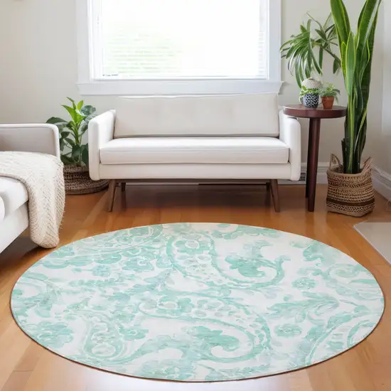 8' Turquoise And Ivory Round Paisley Washable Indoor Outdoor Area Rug Photo 7