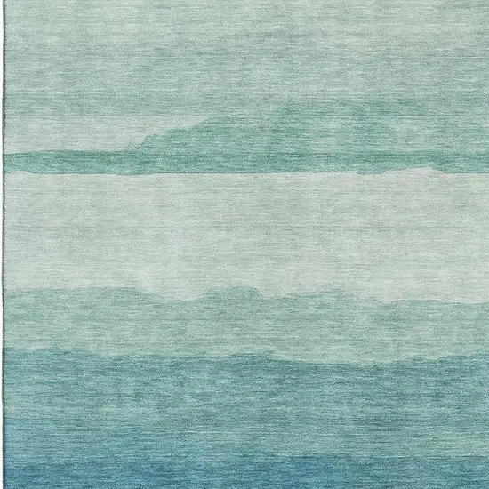 8' Turquoise And Ivory Striped Washable Area Rug With UV Protection Photo 2
