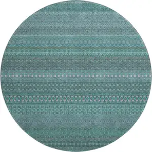 Photo of 8' Turquoise And Ivory Striped Washable Round Rug With UV Protection