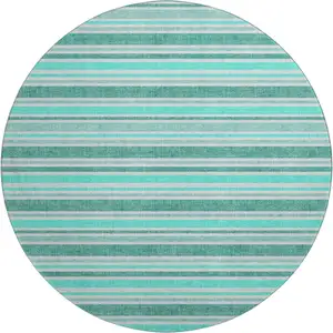 Photo of 8' Turquoise And Ivory Striped Washable Round Rug With UV Protection