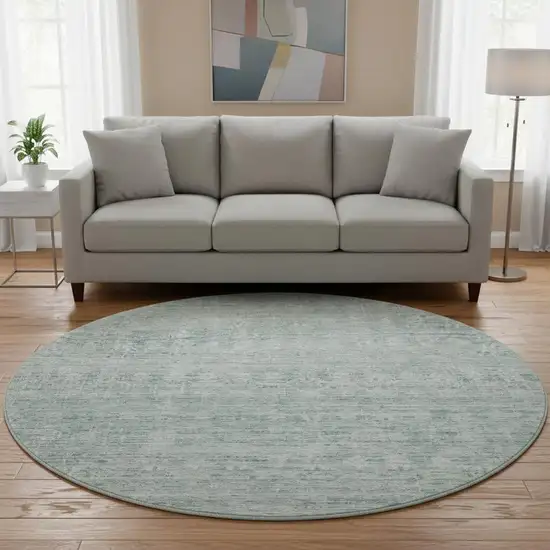 8' Turquoise And Ivory Striped Washable Round Rug With UV Protection Photo 2