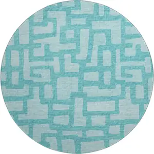 Photo of 8' Turquoise And Sky Blue Abstract Washable Round Rug With UV Protection