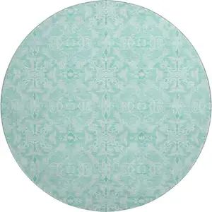 Photo of 8' Turquoise And Teal Medallion Washable Round Rug With UV Protection