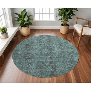 Photo of 8' Turquoise Gray And Ivory Oriental Washable Round Rug With UV Protection