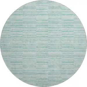 Photo of 8' Turquoise Gray And Ivory Striped Washable Round Rug With UV Protection