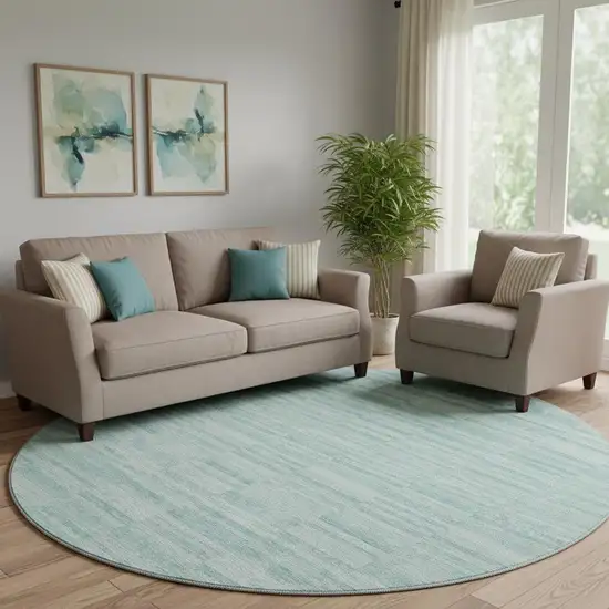 8' Turquoise Gray And Ivory Striped Washable Round Rug With UV Protection Photo 1