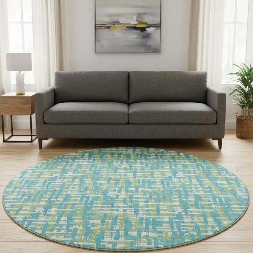 8' Turquoise Green And Ivory Abstract Geometric Washable Round Rug With UV Protection Photo 2