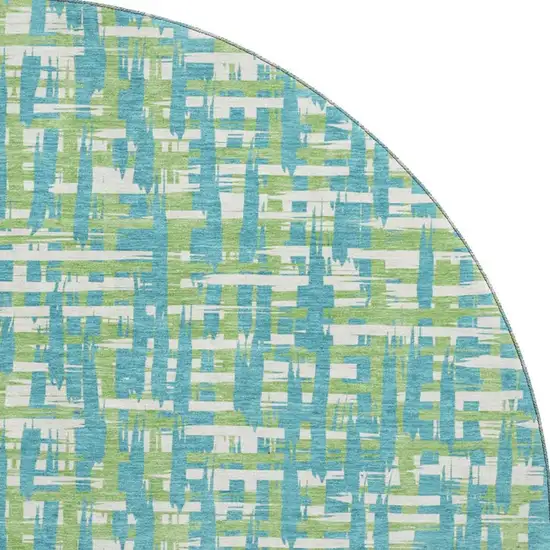 8' Turquoise Green And Ivory Abstract Geometric Washable Round Rug With UV Protection Photo 3