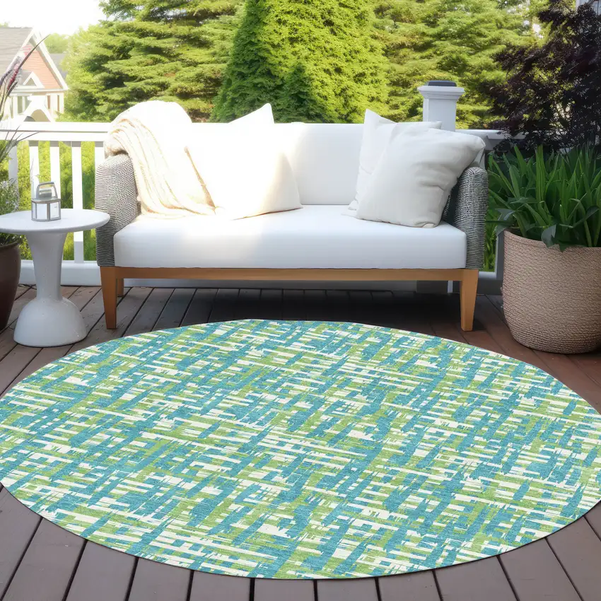 8' Turquoise Green And Ivory Round Abstract Washable Indoor Outdoor Area Rug Photo 8