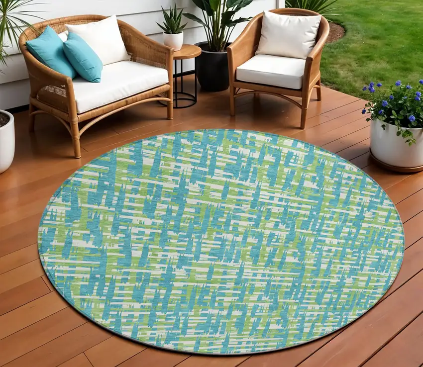8' Turquoise Green And Ivory Round Abstract Washable Indoor Outdoor Area Rug Photo 1