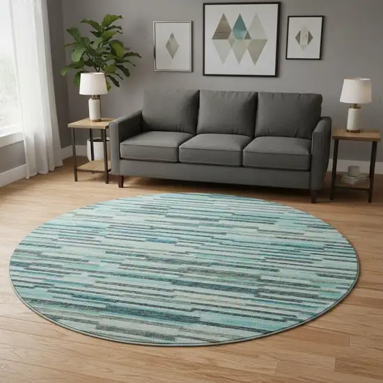 8' Turquoise Teal Blue And Gray Abstract Washable Round Rug With UV Protection Photo 1