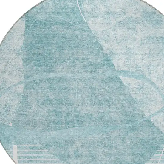 8' Turquoise Teal Blue And Ivory Round Abstract Washable Indoor Outdoor Area Rug Photo 4