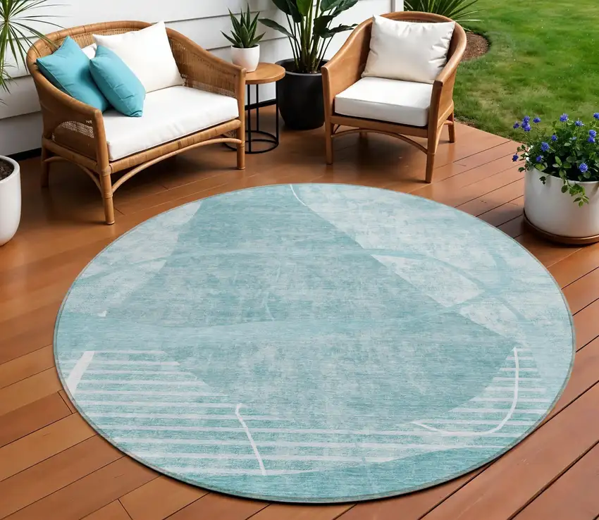 8' Turquoise Teal Blue And Ivory Round Abstract Washable Indoor Outdoor Area Rug Photo 1
