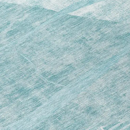 8' Turquoise Teal Blue And Ivory Round Abstract Washable Indoor Outdoor Area Rug Photo 8