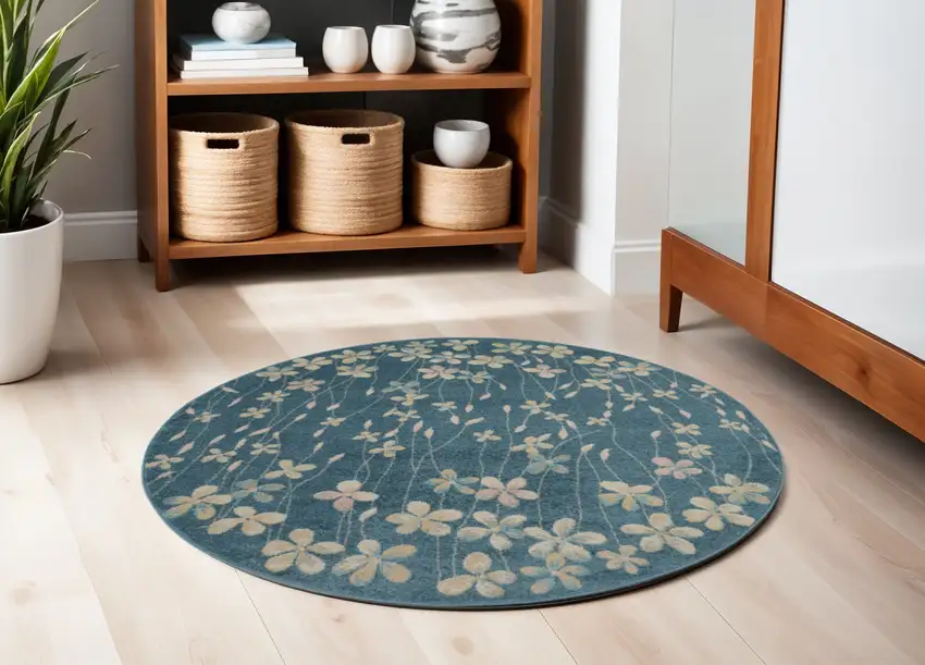5' Turquoise and Cream Botanical Leaves Round Rug Photo 1