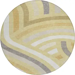 Photo of 8' Wheat And Gold Round Abstract Washable Indoor Outdoor Area Rug