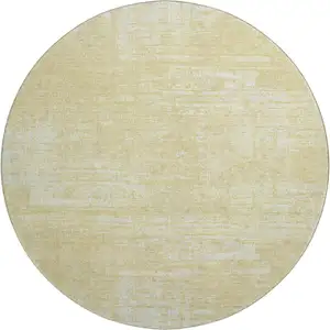 Photo of 8' Wheat And Ivory Abstract Washable Round Rug With UV Protection