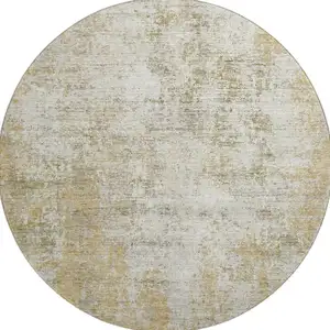 Photo of 8' Wheat And Ivory Abstract Washable Round Rug With UV Protection