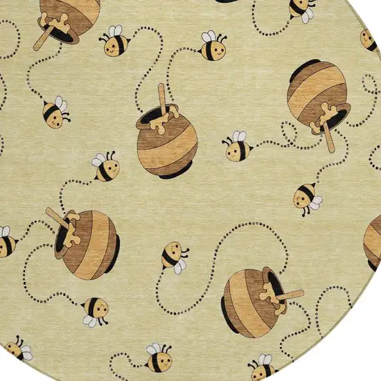 8' Wheat And Ivory Round Geometric Washable Indoor Outdoor Area Rug Photo 4