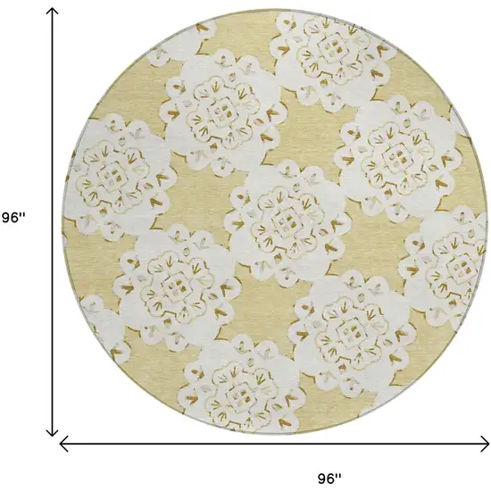 8' Wheat And Ivory Round Quatrefoil Washable Indoor Outdoor Area Rug Photo 3