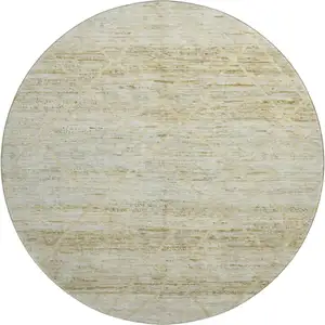 Photo of 8' Wheat Beige And Gold Abstract Geometric Washable Round Rug With UV Protection
