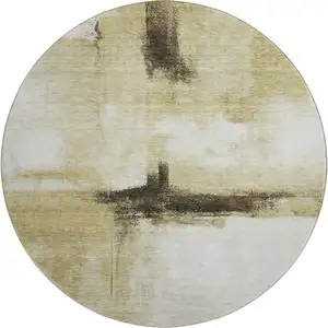 Photo of 8' Wheat Charcoal And Ivory Abstract Washable Round Rug With UV Protection