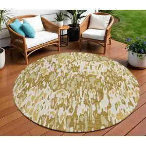 Photo of 8' Wheat Gold And Beige Round Striped Washable Indoor Outdoor Area Rug