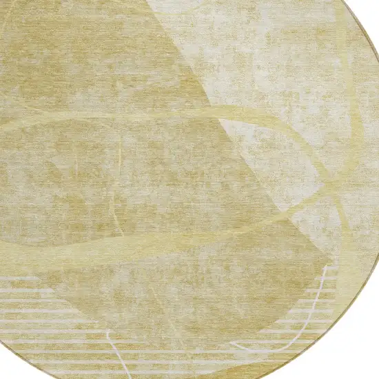 8' Wheat Gold And Ivory Round Abstract Washable Indoor Outdoor Area Rug Photo 4