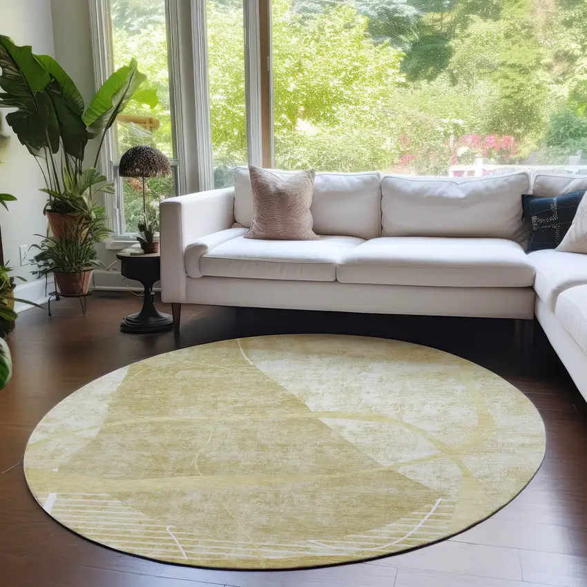 8' Wheat Gold And Ivory Round Abstract Washable Indoor Outdoor Area Rug Photo 7