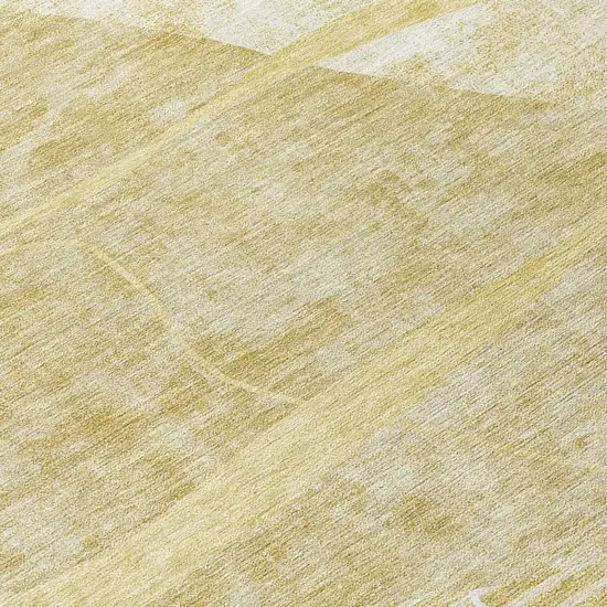 8' Wheat Gold And Ivory Round Abstract Washable Indoor Outdoor Area Rug Photo 8