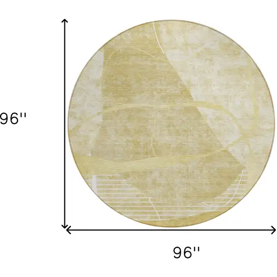 8' Wheat Gold And Ivory Round Abstract Washable Indoor Outdoor Area Rug Photo 3
